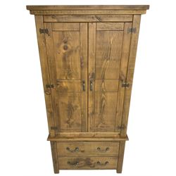 Rustic pine wardrobe, two doors above two drawers 