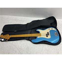 Richwood electric bass guitar in blue, cream and natural finish L117cm; in Fender soft carrying case; together with Behringer Thunderbird Bx108 amplifier date code 0 4 11.