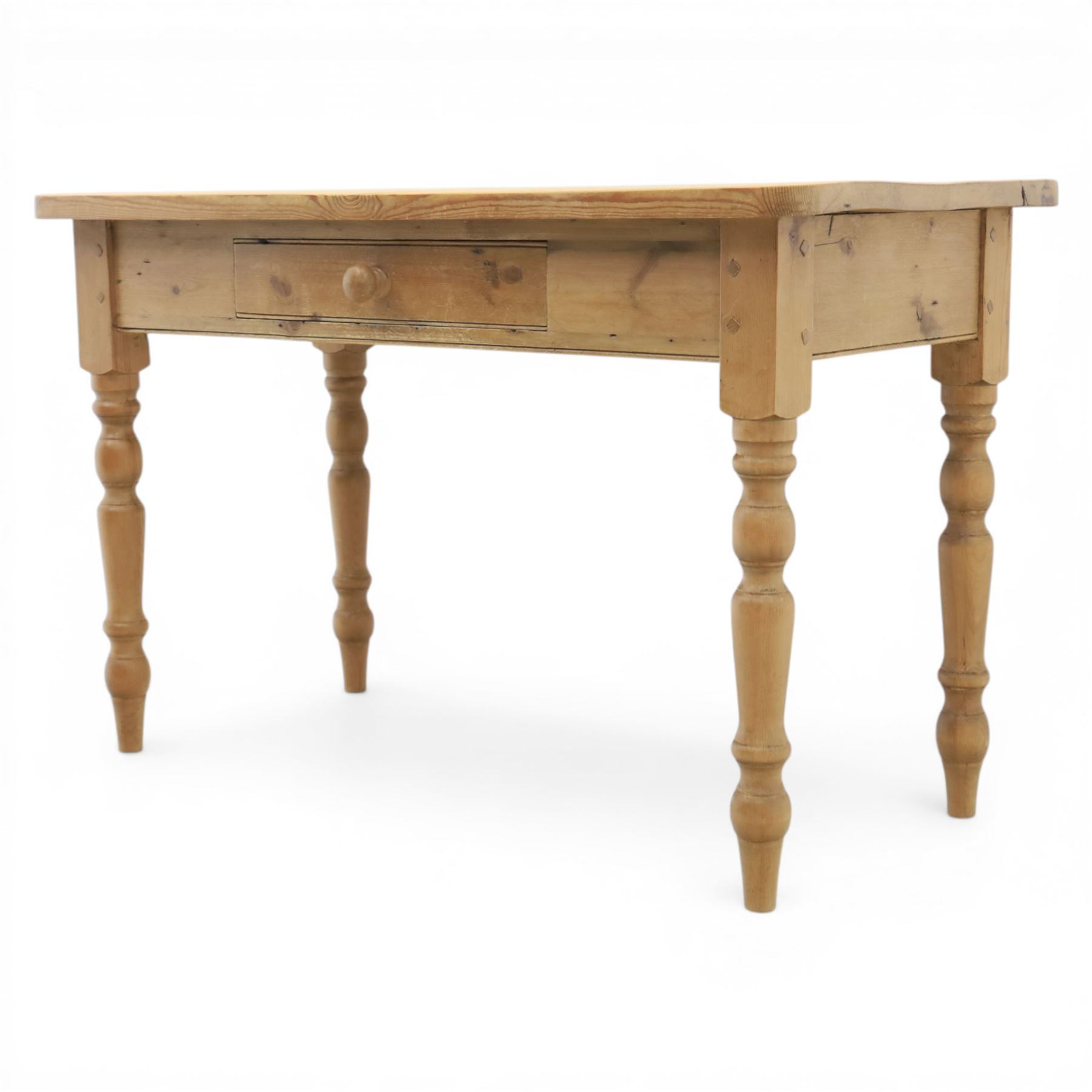 Victorian design stripped pine table, rectangular top with rounded corners, single centre drawer, raised on four turned legs