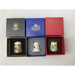 Quantity of thimbles to include twelve Irish Dresden lace examples, Royal Crown Derby, Spode, Portmeirion, Wedgwood, Royal Grafton etc, together with three display cases, many with certificates