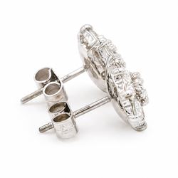 Pair of 18ct white gold diamond flower head earrings, each stud set with nine round brilliant cut diamonds, Birmingham 1996, total diamond weight approx 1.20 carat