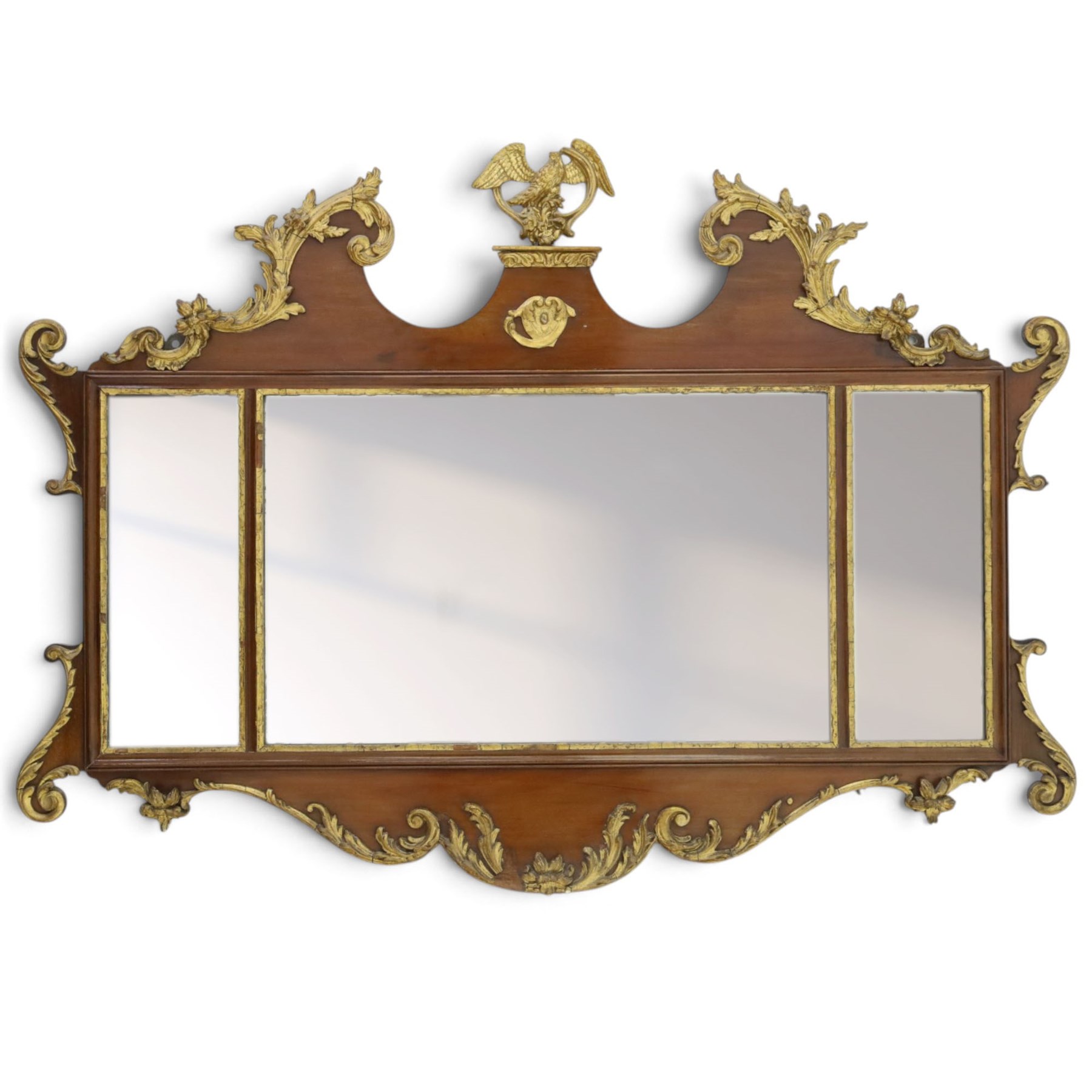 George III Chippendale design mahogany and parcel-gilt tripartite fret mirror with Hoho bird pediment