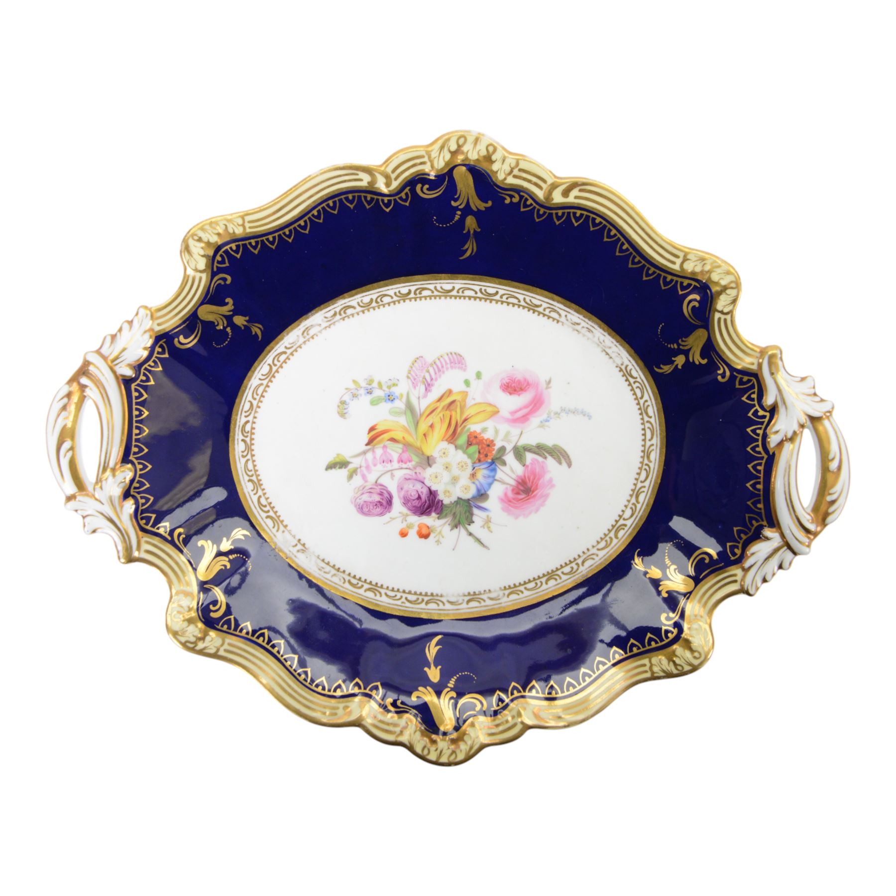 Collection of 19th century porcelain dessert wares, comprising Bloor Derby dish, circa 1825, Spode Felspar shaped oval dish, circa 1820, Ridgeway shaped oval footed dish with twin handles, circa 1840, Ridgeway dish, circa 1820, and tazza and dish, probably Minton, pattern 4810, each decorated in various patterns with floral sprays against dark blue grounds and heightened with gilt