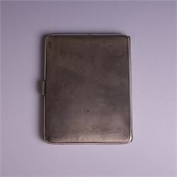 1930s silver cigarette case, of rectangular form with rounded corners, with engine turned decoration throughout, with personal engraving to interior, hallmarked Padgett & Braham Ltd, London 1931, L 11cm 