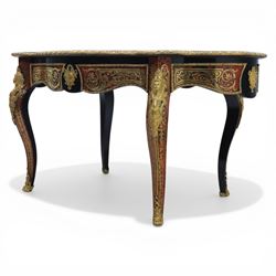 Late 19th century boulle work centre table, shaped serpentine top decorated with brass inlay on red tortoiseshell ground within ebonised border, fitted with single frieze drawer, on cabriole supports with gilt metal mounts and mask terminals
