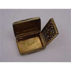 George III silver vinaigrette, of typical rectangular form, with raised foliate rim and engine turned decoration, with banded sides and foliate pierced engraving to gilt interior, hallmarked Birmingham 1797, maker's mark TS, L3cm