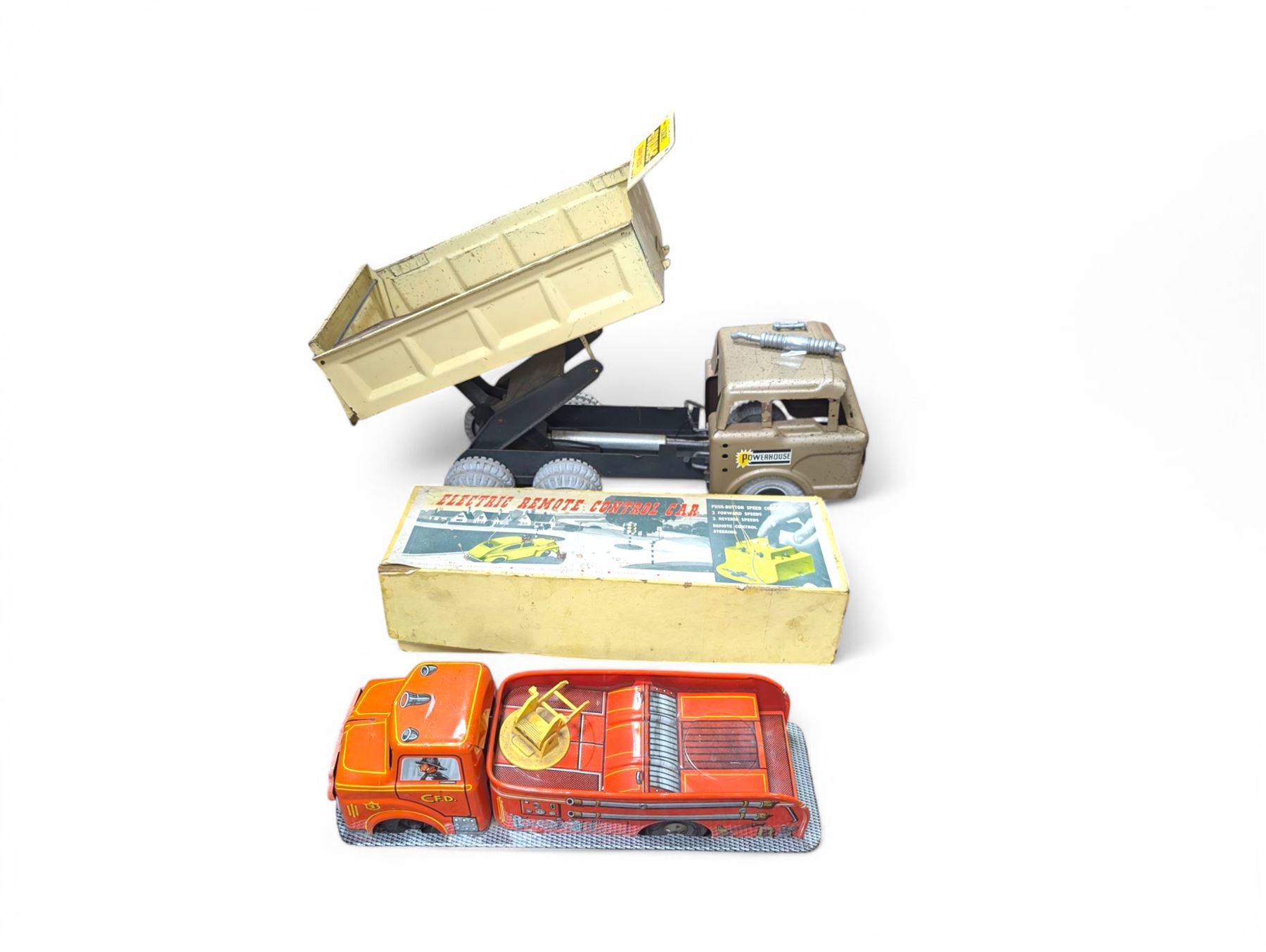 Marx Scissors Hydraulic Dump Truck, Electric Remote Control Car and a tinplate fire engine, dump truck H