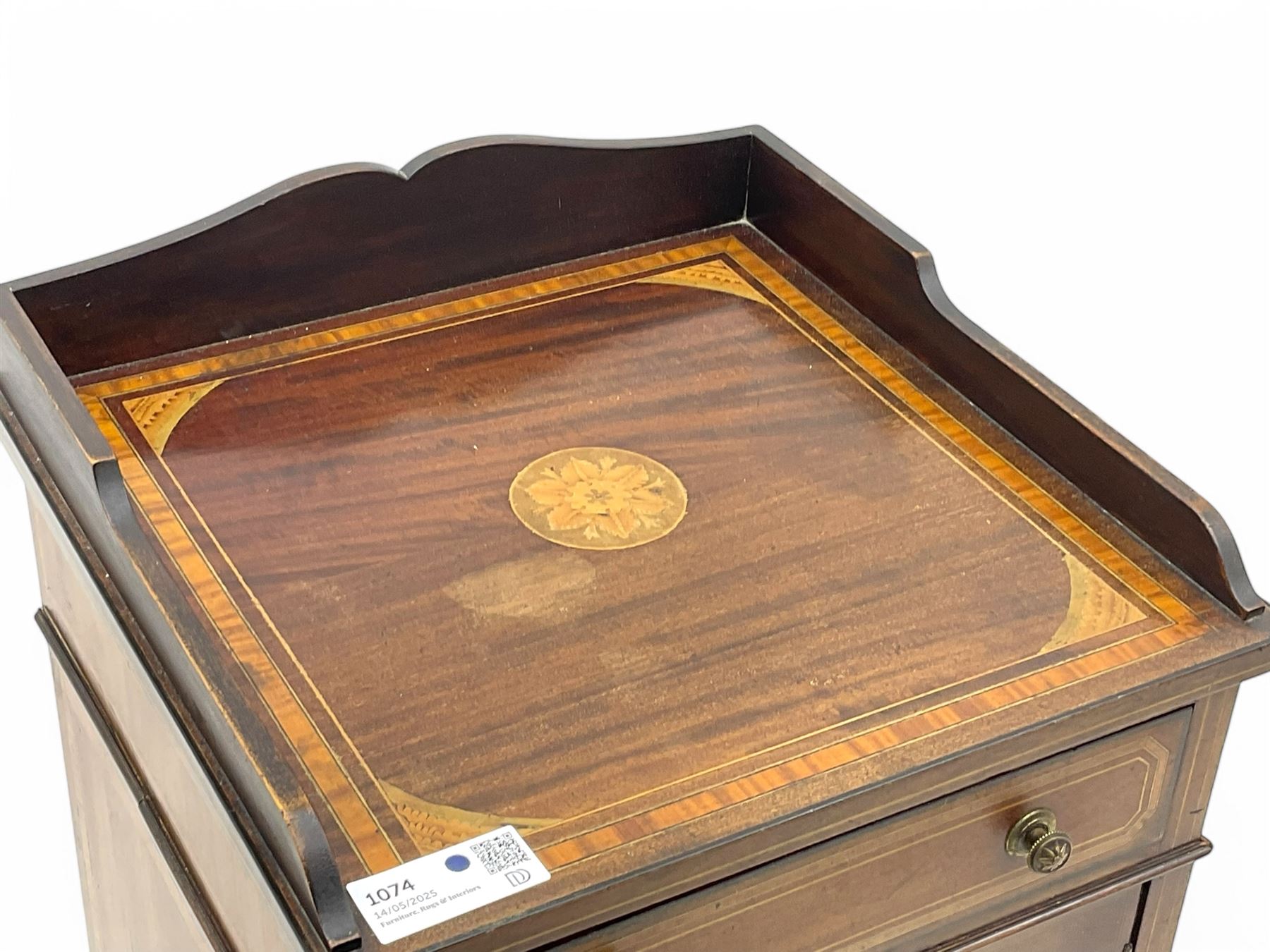 Edwardian mahogany inlaid bedside cabinet, inlaid top with gallery above, single drawer with button handles and single shelf cupboard, on scroll carved bracket feet