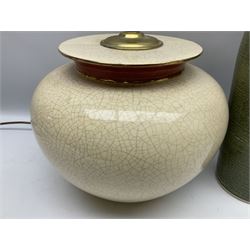 Large cream crackle glaze table lamp, together with a tall studio pottery vase in green with single loop handle, with impressed makers mark, H49cm
