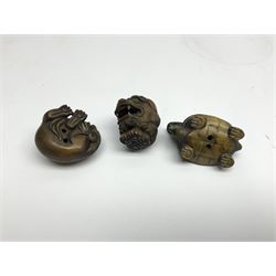 Three netsuke, modelled as mythical creatures 