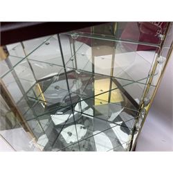 Swarovski Crystal Masquerade trilogy; 1999 Masquerade Pierrot, 2000 Columbine, 2001 Harlequin all with accompanying plaque, stand and original box, together with a glass display case with mirrored back and sides 