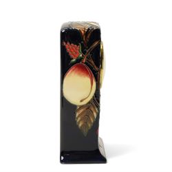 Moorcroft Queens Choice pattern mantel clock, H16cm; together with an Anemone pattern pin tray, W20cm (2)