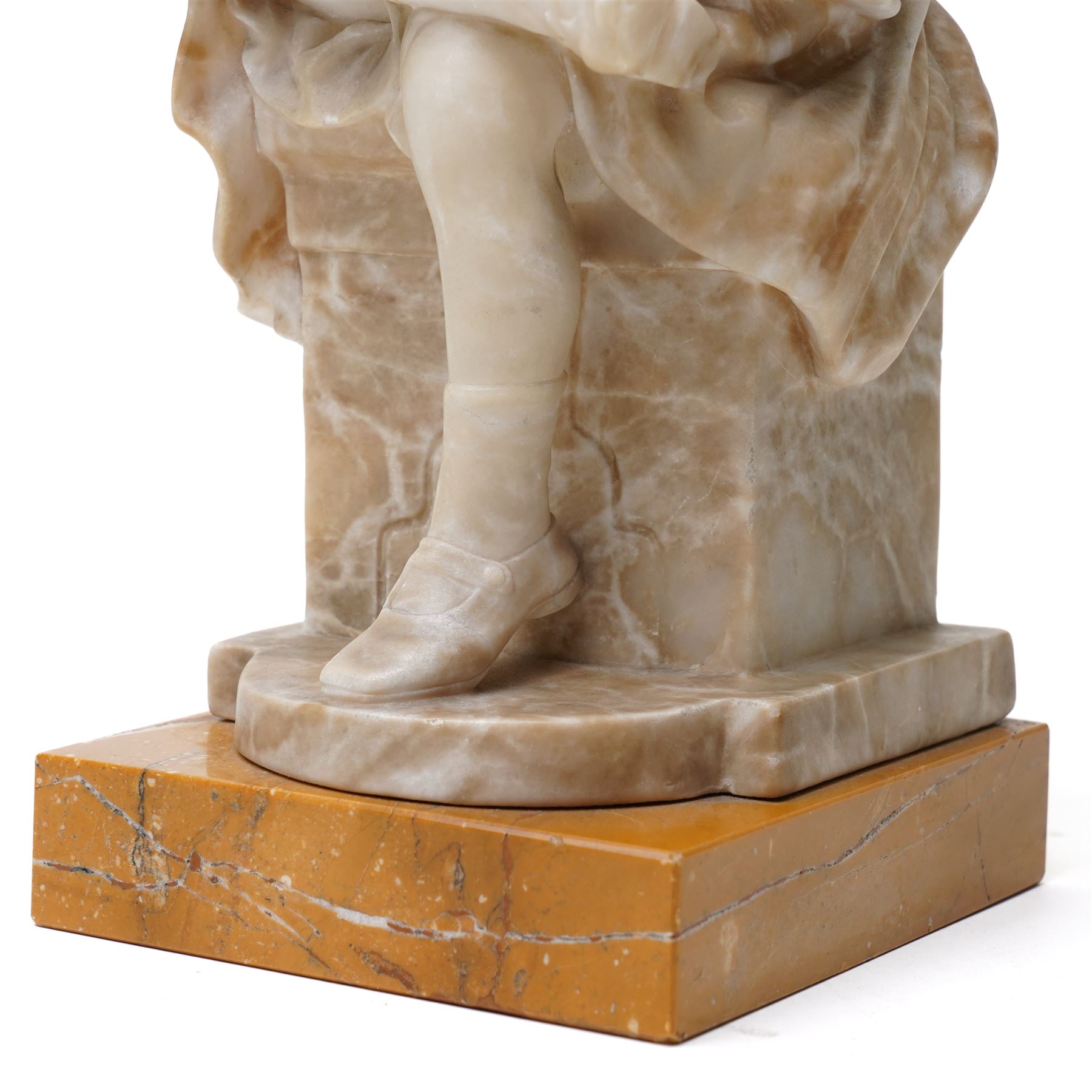 Attrib. Ernst Paul Hinckeldey (German 1893-1953): Girl Reading, alabaster sculpture bearing signature to plinth verso, on marble base H29cm 