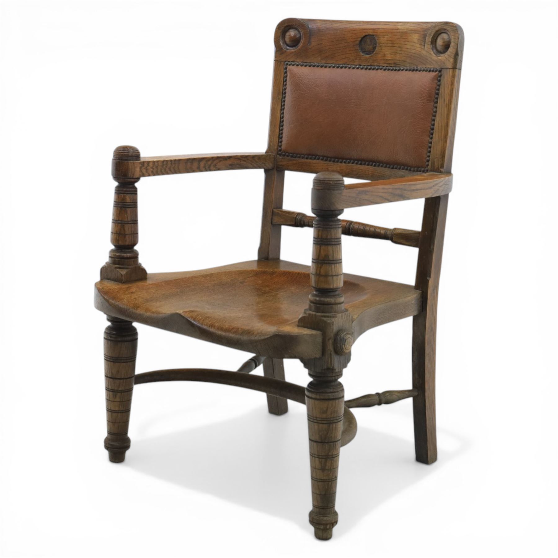 Arts and Crafts oak open armchair with dished seat