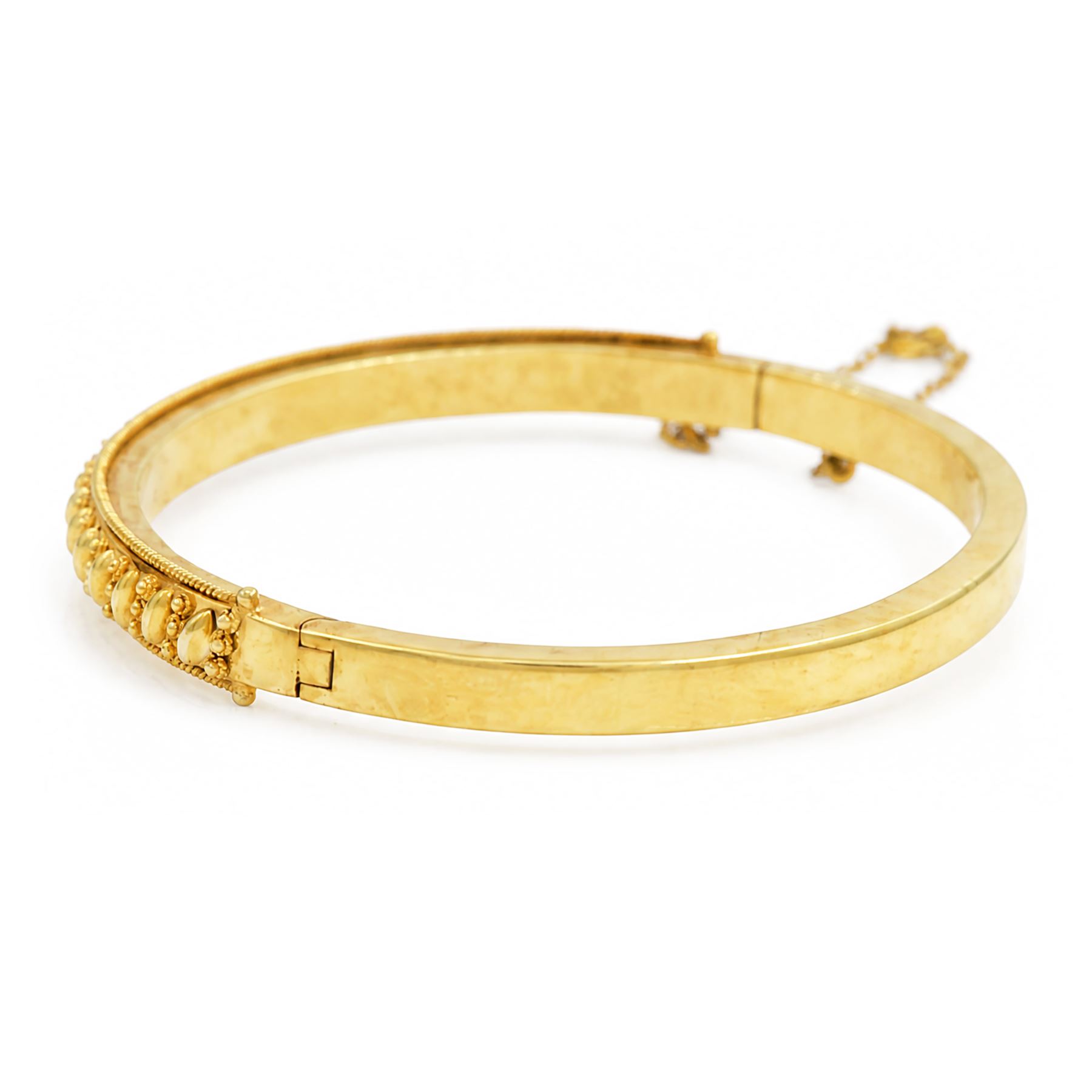 14ct gold hinged bangle, with beaded and rope twist decoration, London import mark 1989