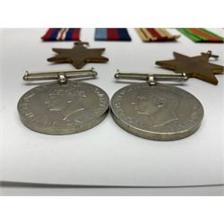 Twelve WW2 medals comprising four 1939-1945 war medals, four Defence medals, three 1939-1945 Stars and Africa Star; all with ribbons; some as groups in two issue boxes with slips