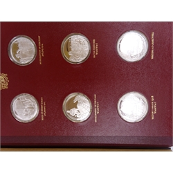  Collection of twenty-four sterling silver hallmarked medals by John Pinches, in original presentation folder  