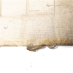 Algernon Percy, 10th Earl of Northumberland: English Civil War period vellum indenture, dated 16 August 1647, between Algernon Percy, Earl of Northumberland and Elizabeth, Countess of Northumberland, relating to a cottage, garth and lands at Hunmanby, Yorkshire, granted to Guy Pickering and Robert Pickering, with reference to Hugh Potter and Peter Dodsworth, manuscript on vellum with decorative initial, pendant seal tag and signatures/witnesses verso

Notes:
Algernon Percy, 10th Earl of Northumberland (1602-1668), was Lord High Admiral to Charles I and later a leading moderate Parliamentarian during the English Civil War. Dated August 1647, this indenture was executed in the aftermath of the First Civil War, while Percy was closely involved in Parliamentary government and in the custody of the King’s younger children. The document concerns property at Hunmanby, Yorkshire, and includes reference to tenure connected with the Crown and King Henry VIII