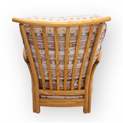 Ercol - Renaissance ash and elm high back armchair, upholstered in geometric Kilim patterned fabric with padded back, seat and arm cushions, curved stick back frame and turned supports