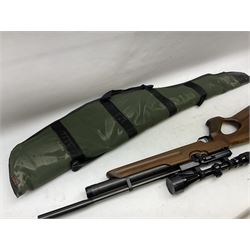 Weihrauch HW100 .22 calibre PCP repeating air rifle; walnut thumbhole stock with textured pistol-grip; Nikko Stirling Silver Crown 3-9x40 telescopic sight; integral sound moderator; No.1901181 L99cm overall; in gun sling; with Logun Combi-Pump and quantity of pellets