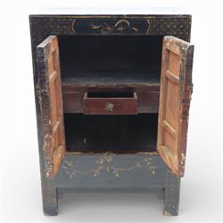 19th century Chinese black lacquer marriage cabinet, rectangular form, twin cupboard doors painted with gilt chinoiserie scenes depicting mounted figures, ritual urns and symbolic objects within patterned borders, central shaped metal lock plate with twin drop handles, lower section decorated with fruiting sprays, standing on stile supports