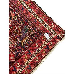 North African flat-woven rug, decorated with small stylised animal and bird motifs, five geometric star medallions