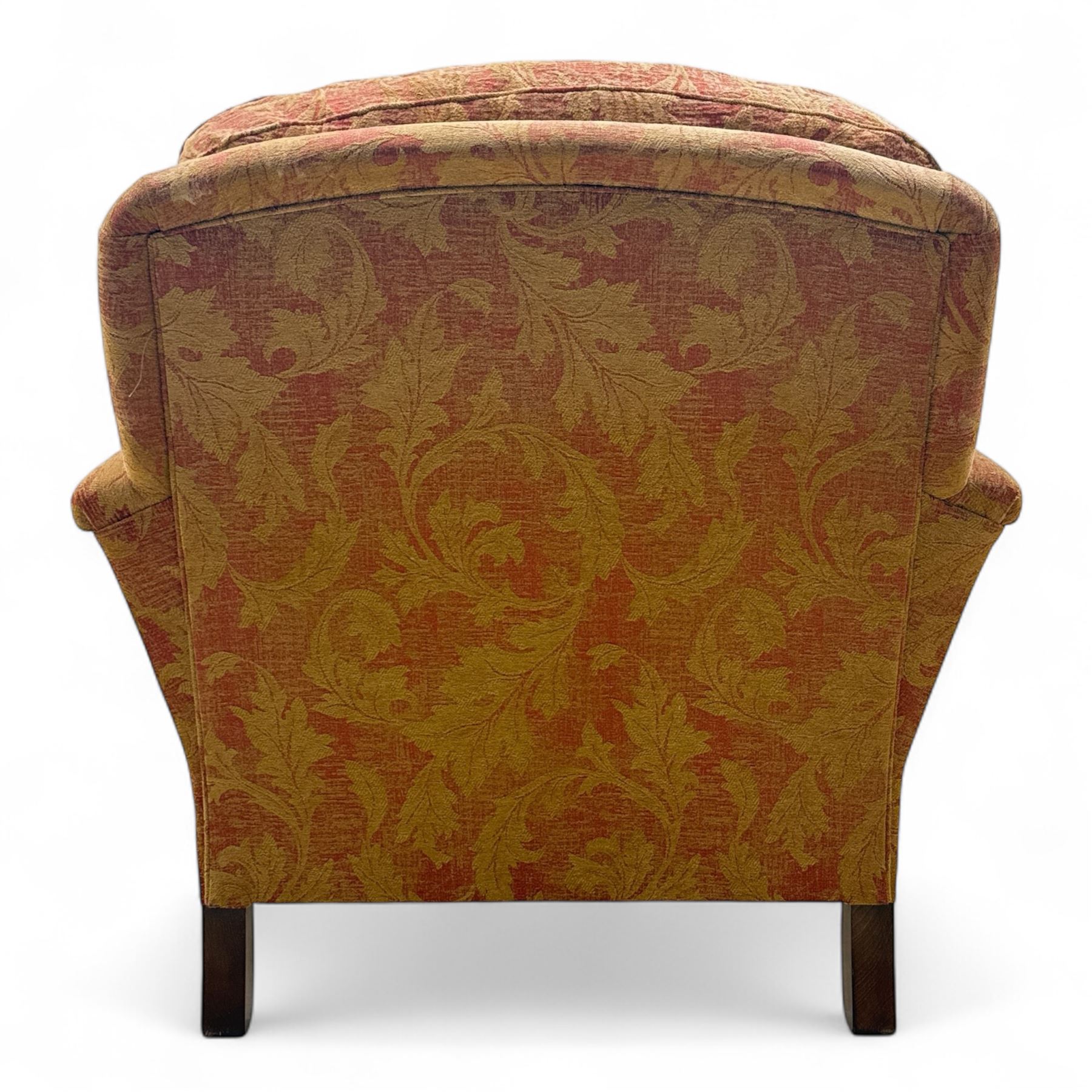Duresta - Contemporary pair of upholstered armchairs, in red and gold damask style fabric, each with sprung seat and removable cushion back, rolled arms, on turned front supports with brass castors, square back legs 