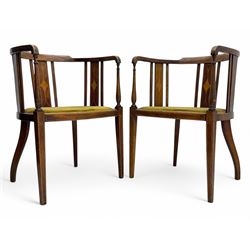 Pair of early 20th century Edwardian inlaid mahogany elbow chairs, shaped top rails with central diamond motif and line inlays, flanked by turned uprights, green velvet seats, on square tapered legs
