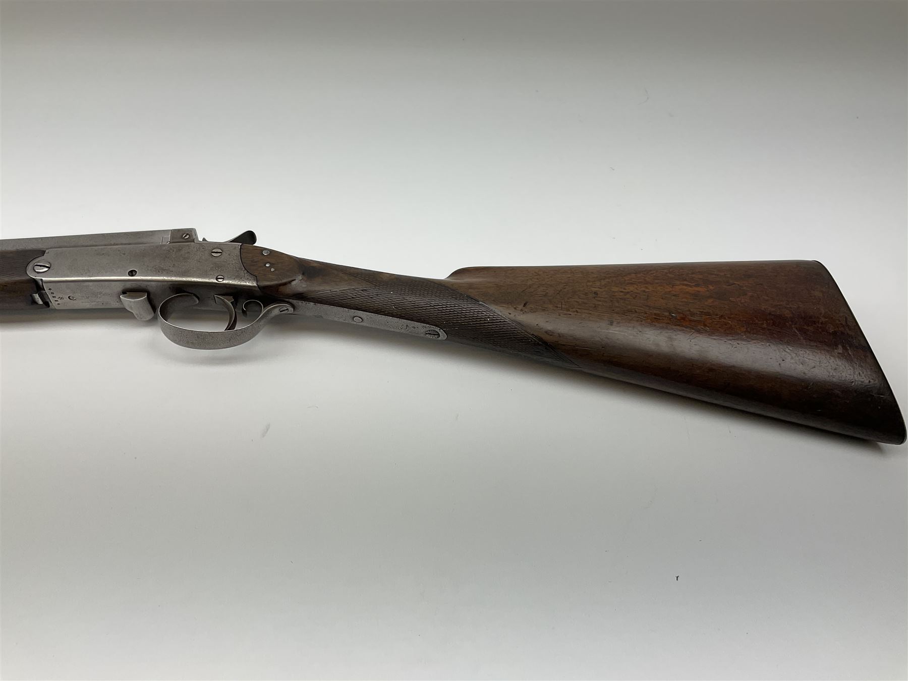 W. Horton 98 Buchanan Street Glasgow 20-bore single barrel centre hammer sporting gun, 71cm octagonal to round barrel with side lever opening, walnut stock with chequered grip and fore-end and steel butt plate, serial no.40334, L110cm SHOTGUN CERTIFICATE REQUIRED