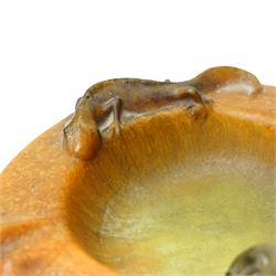 Amalric Walter (1870-1959) and Henri Berge (1868-1936), Nancy, France, circa 1920, pate de verre, Salamander ashtray, bearing moulded mark 'A Walter Nancy' and incised mark 'Berge sc.', D12cm

Note: Almaric Walter, born in Sèvres near Paris, exhibited at the Salon des Artistes Françaises in 1895 and 1903, and in 1908 moved to Nancy where he established his own workshop within the Daum glassworks. There he worked closely with Daum designers, including Henri Bergé. This ashtray is an example of Walter’s pâte-de-verre technique.

Provenance: From the collection of Andrew Chichester Everitt.