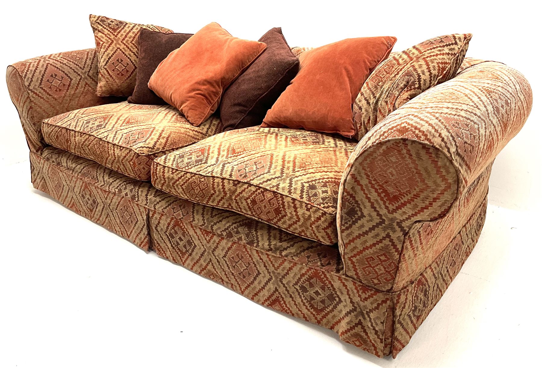Tetrad kilim grand sofa, together with feather filled scatter cushions
