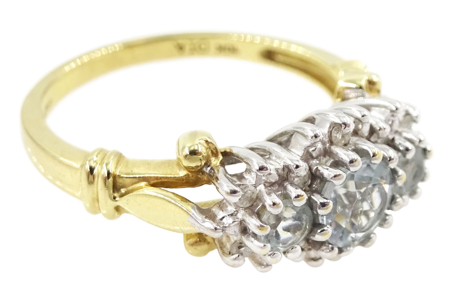 9ct gold aquamarine and diamond cluster ring, three round cut aquamarines, with diamond chip surround and scroll design shoulders, hallmarked