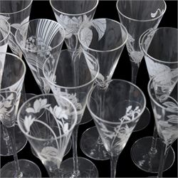 Twelve Crystal champagne glasses Les Fleurs, issued by the Franklin Mint in collaboration with Perrier Jouet, each glass is etched with a different flower, all boxed 