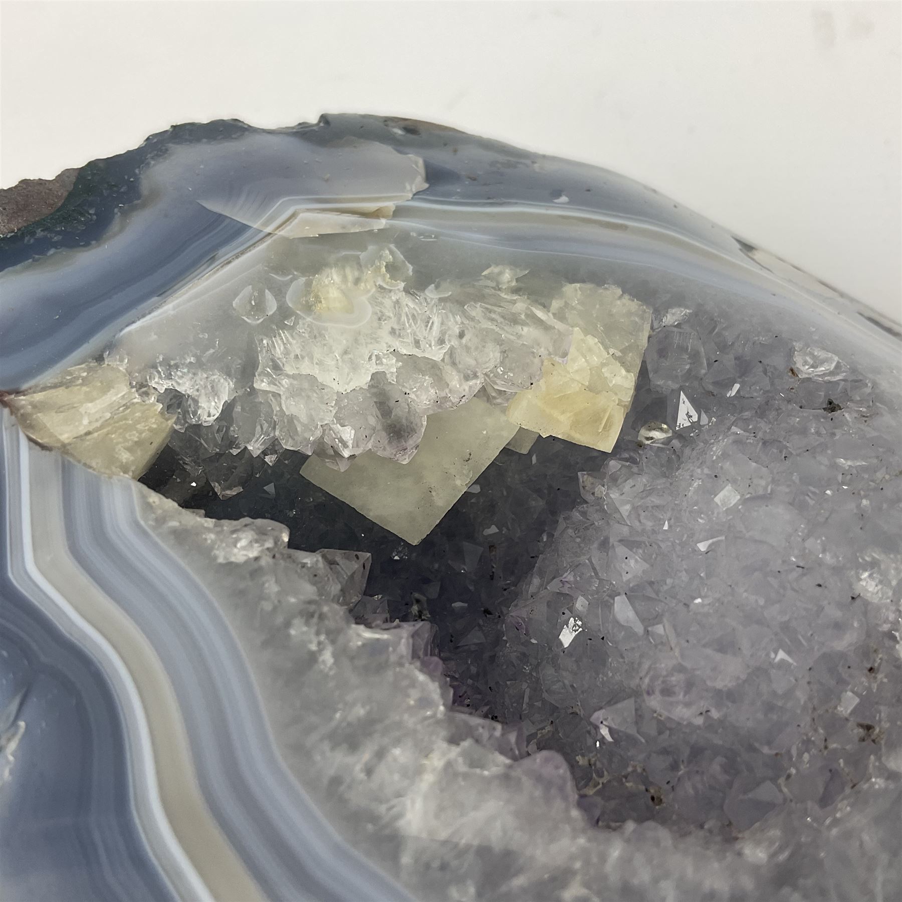 Amethyst crystal geode cluster, with well-defined crystals of various sizes, in purple tones, H12cm 