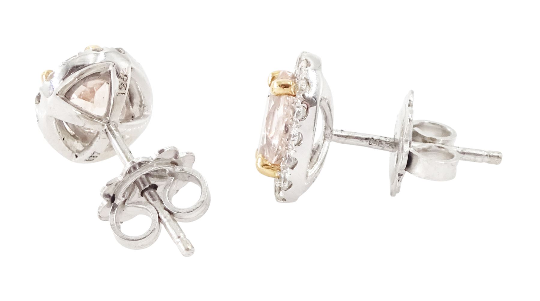 Pair of 18ct white and rose gold morganite and diamond earrings, each stud set with a single oval cut morganite, surrounded by round brilliant cut diamonds, hallmarked, total morganite weight approx 1.40 carat, total diamond weight 0.37 carat