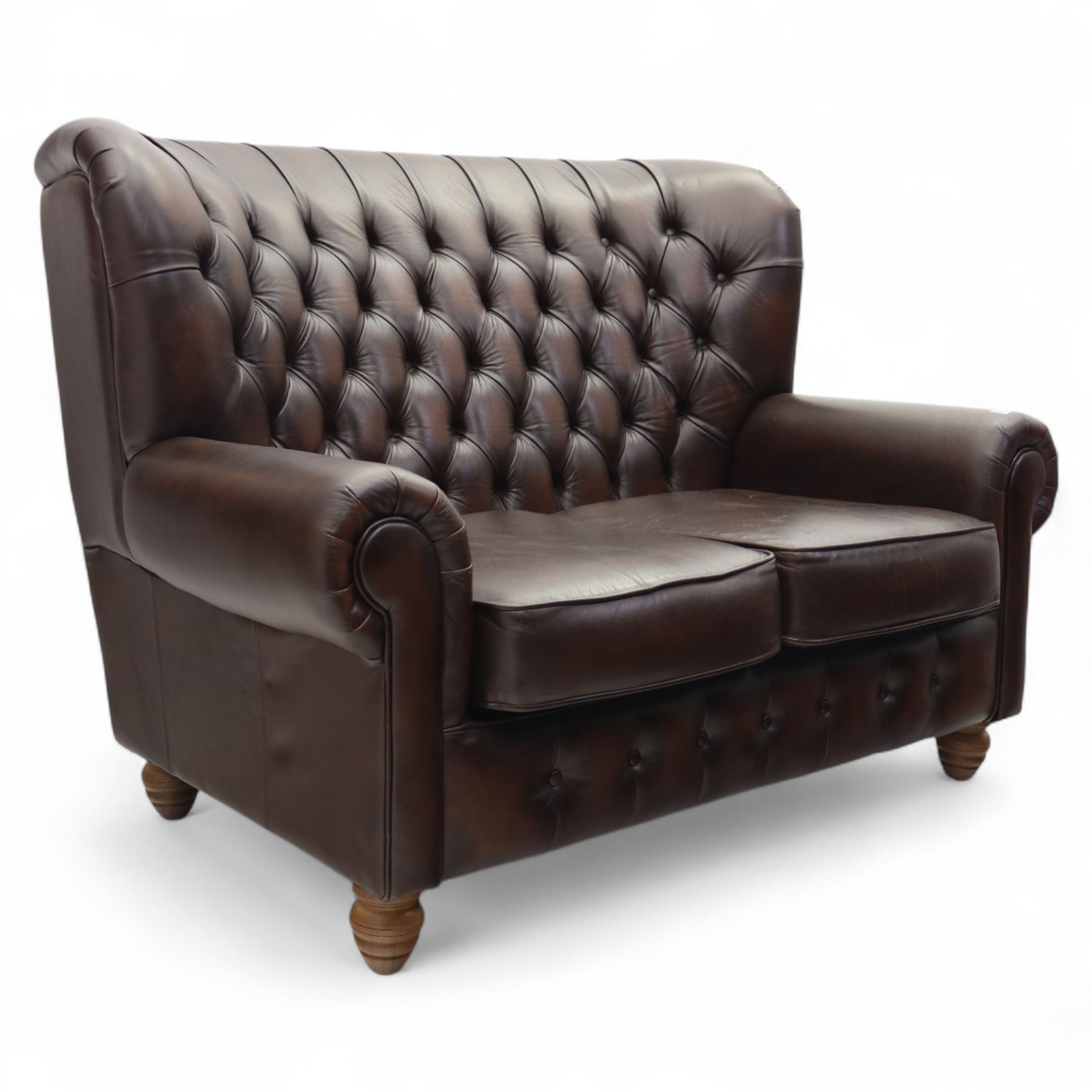 Thomas Lloyd  - two-seater settee, brown leather,  button upholstered back, cushion seats, and wide scrolled arms, raised on bun feet