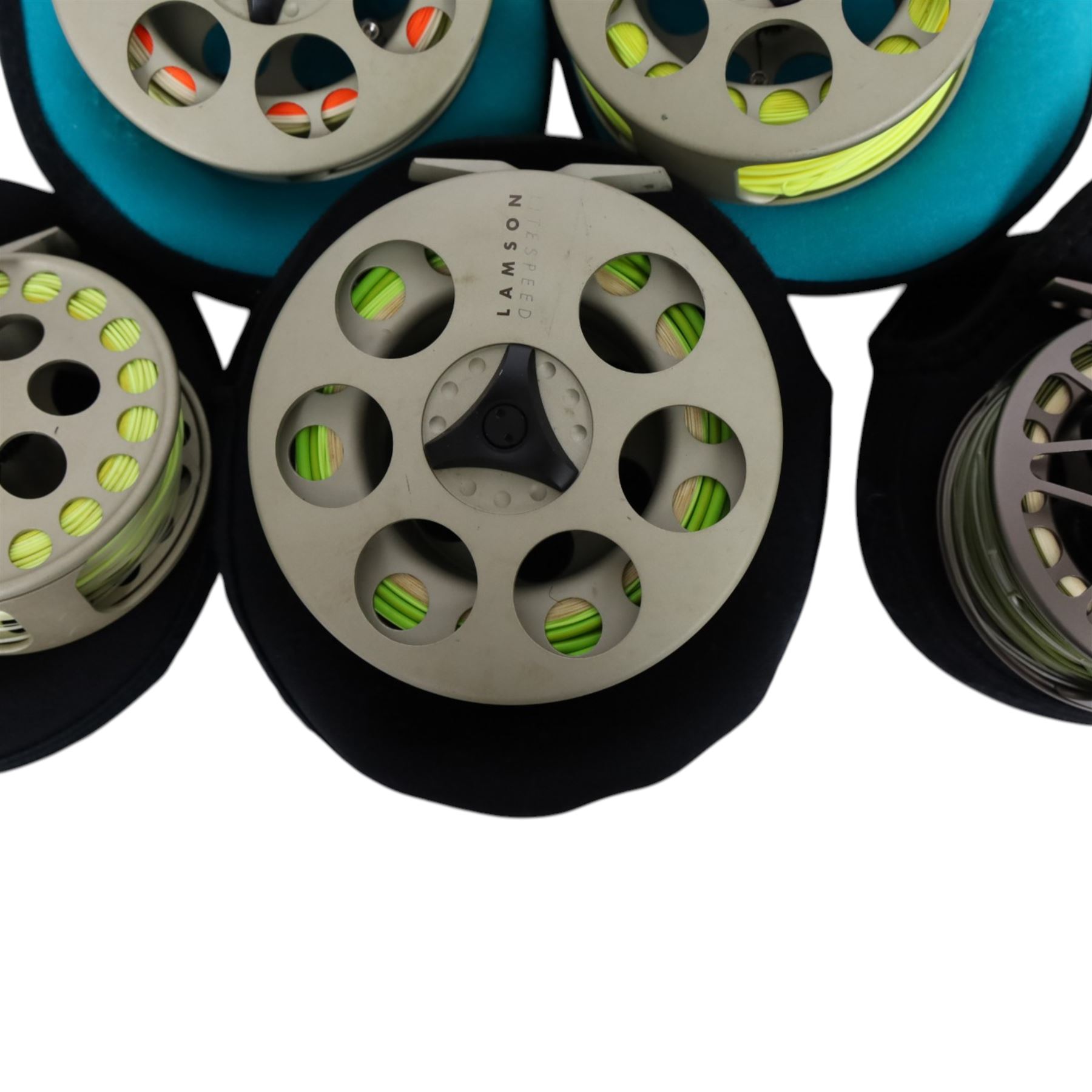 Five Lamson Litespeed fly reels, comprising LS4, two LS2, two LS3.5, all within Lamson soft pouches