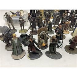 Approximately 80 NLP Lord of the Rings heavy metal painted figurines to include Fell Beast, boxed, and The Watcher, The Dark Lord Sauron, Treebeard etc, and unassociated Dracula themed composite figures marked HHFT50 