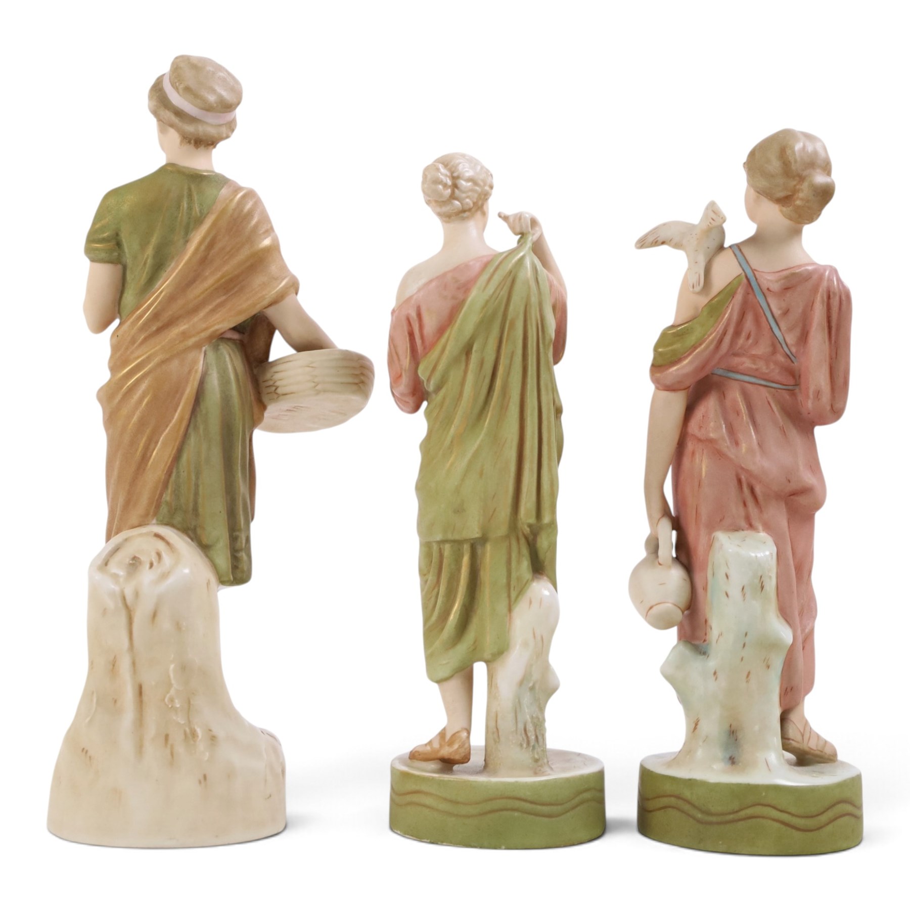 Three Royal Dux figures, Fruit Picker, no. 2082, Lady with Dove, no 2132 and Lady with Shawl no 2133, H23cm