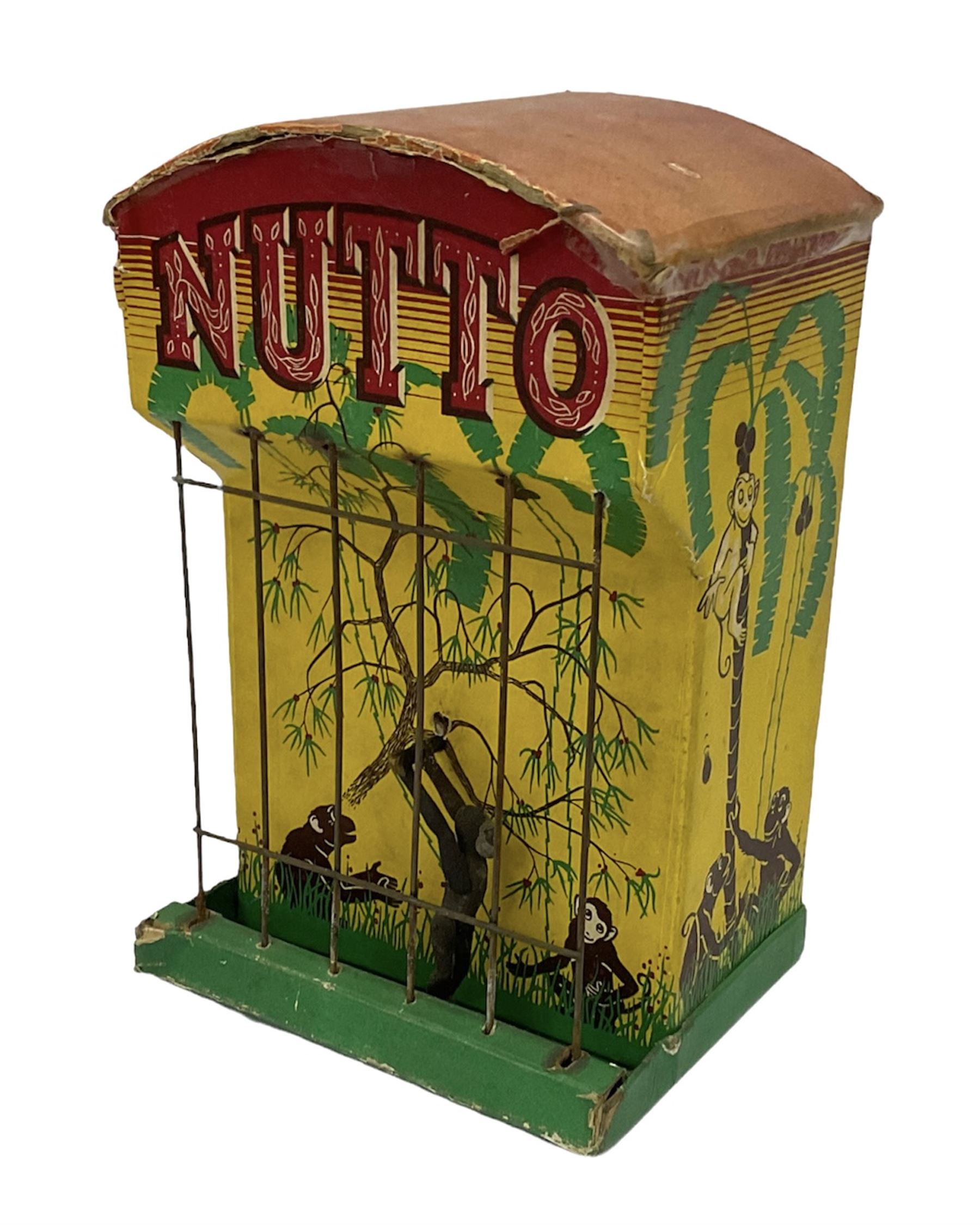 'Nutto' Sand automation acrobatic monkey performing in a cage toy
