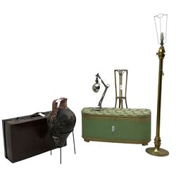Amphora-shaped vase on metal stand; vintage suitcase; adjustable table or desk lamp; Lloyd Loom design D-shaped blanket box (W93cm, H39cm, D39cm); a brass standard lamp; and a bamboo plant stand (6)