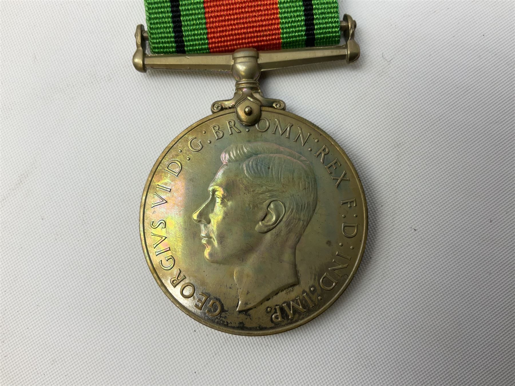 WW1 group of three medals comprising British War Medal and Victory Medal in issue box and Ceylon Volunteer Service Medal awarded to 10288 Pte. M. Smith R. Fus.; together with a later awarded WW2 Defence Medal in modern box with slip; and his QEII Imperial Service Medal in case and box with certificate dated 1959