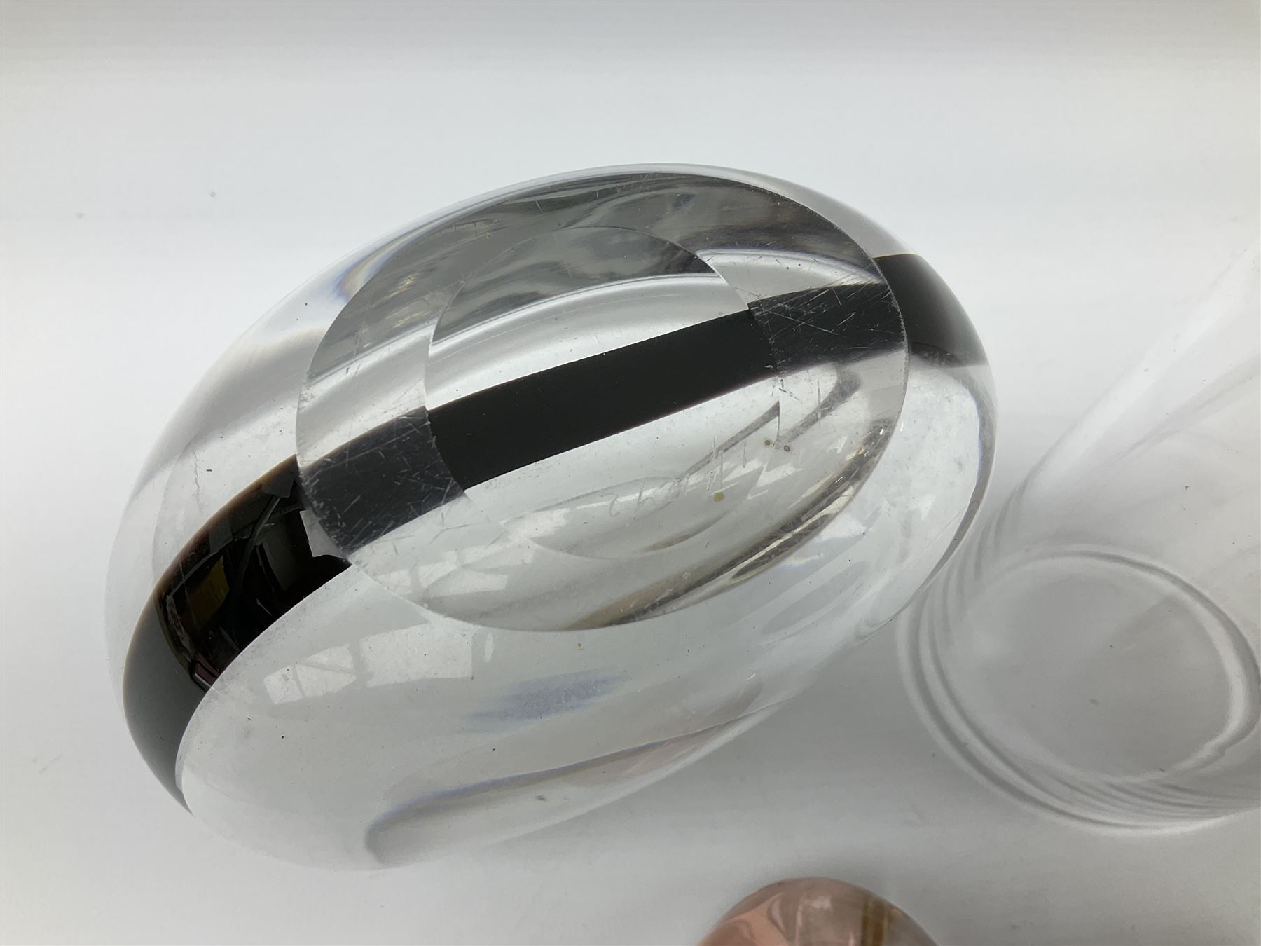 Vicke Lindstrand for Kosta glass vase of flattened ovoid form, the body with deep purple band from rim to rim, signed LH 1242 beneath, together with Orrefors glass vase, engraved with female figure with birds, signed beneath, art glass bowl and paperweight (4) tallest H23.5cm