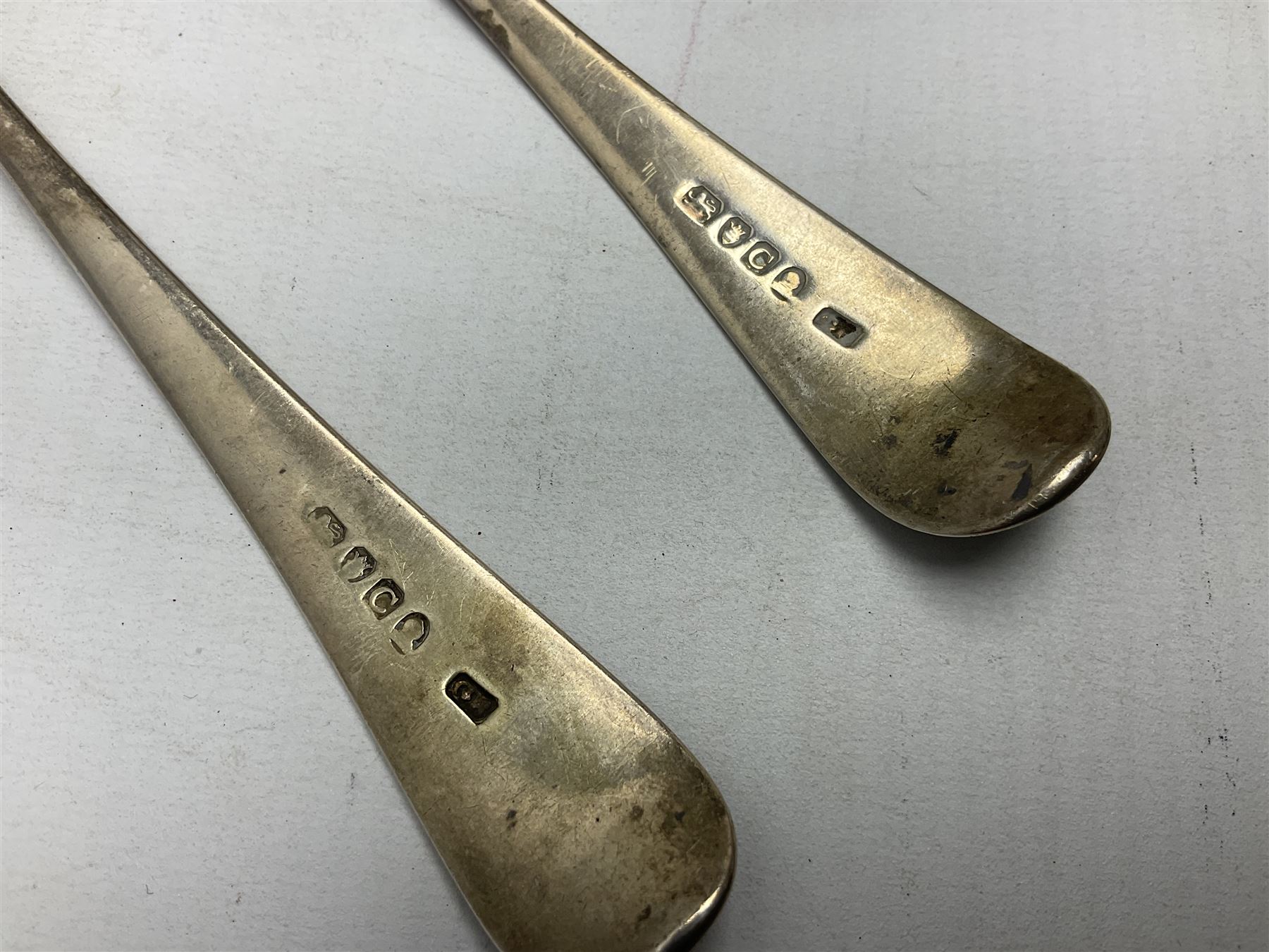 Two silver Georgian tablespoons, approximate total weight 3.36 ozt (104.7 grams), together with Great War Peace Medal 1919 and two others 