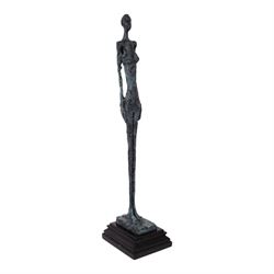 After Alberto Giacometti - Femme Venise bronze upon a stepped marble base, overall H50cm