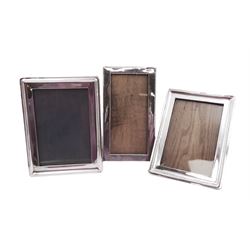 Three mid 20th century silver mounted photograph frames, all of rectangular form, with wooden easel style supports verso, tallest H24cm, all hallmarked