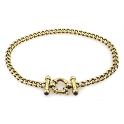  Gold curb link bracelet, the ends set with cabochon sapphires, hallmarked 9ct  