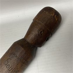 WW1 Prisoner of War carved beech walking cane, the terminal as a head wearing a helmet, and inscribed 'Souvenir from 370th PoW Coy Menin 1919'; bears metal plaque with indistinct monogram L91cm