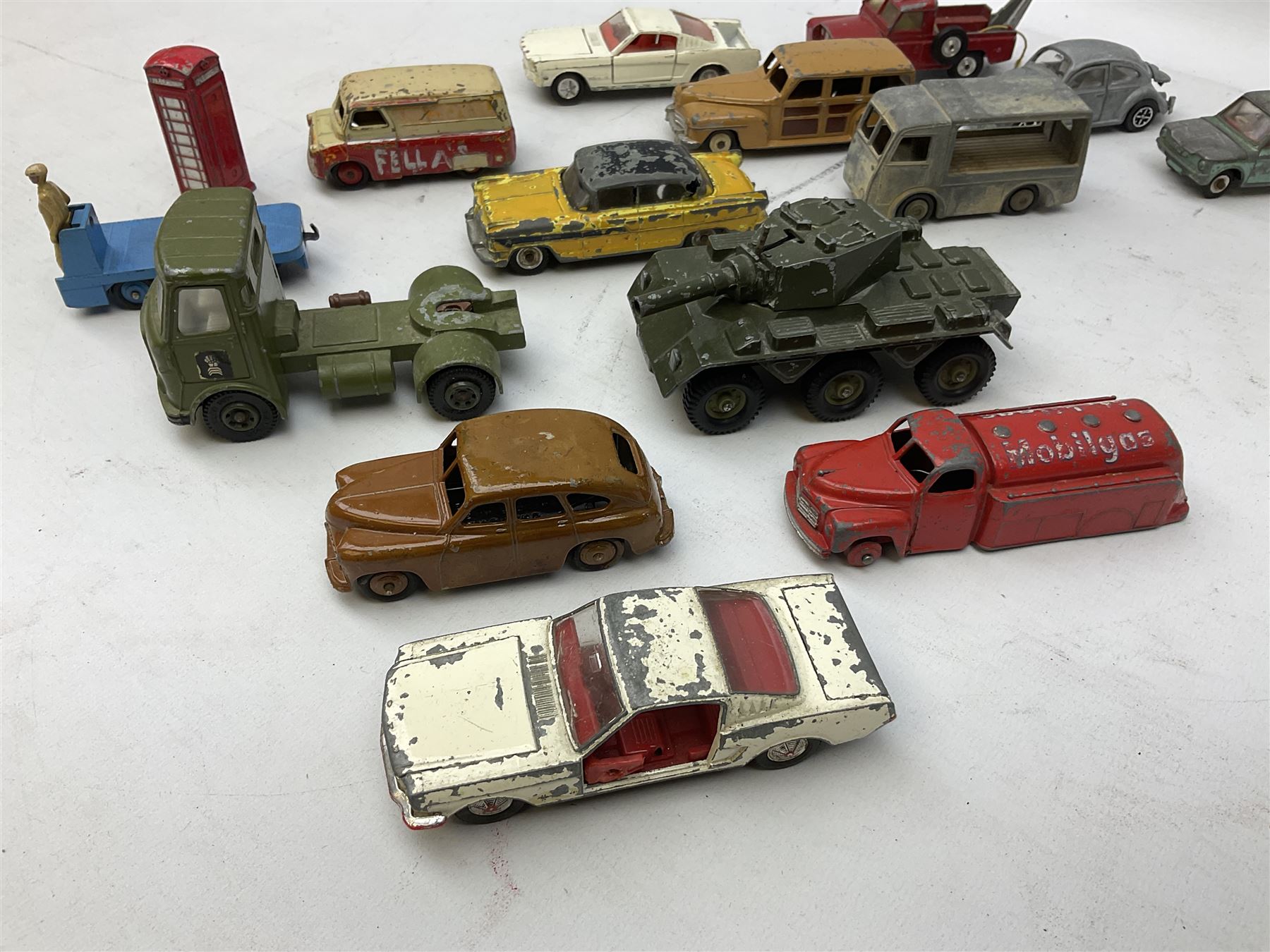 Dinky/Corgi - twenty-nine unboxed and playworn die-cast models including Mobilgas Tanker, two BEV Trucks, Aveling-Barford steam roller, Coventry Climax fork-lift, Hudson Hornet, Vanguard, Post Office Telephones Van, Royal Mail Van etc