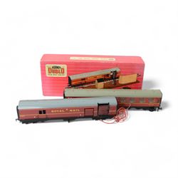 Scalextric James Bond 007 set, comprising two cars; 1967/68 Aston Martin DB5 in white with red interior, ejector seat and machine guns to front with James Bond and villain figure and  007 Mercedes 190SL in black with red interior with driver figure and sniper figure, with two blue controllers, track and instruction booklets, in original box